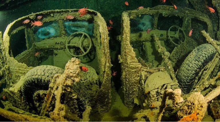 Diving in the Red Sea. Thistlegorm holds, English trucks